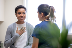 Female patient speaking to female medical provider