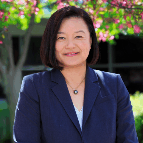 Image of Hae Mi with beautiful trees in background